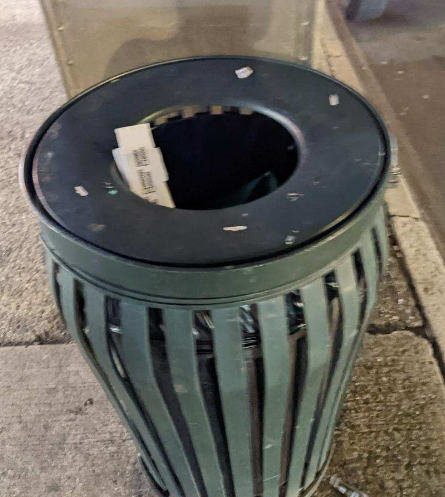 Trash can where pizza crust containing DNA evidence was found, linked to Rex Heuermann.