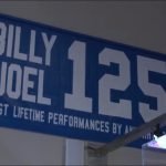 Billy Joel 125 banner celebrating the most lifetime performances by any artist at the Long Island Music & Entertainment Hall of Fame exhibit.