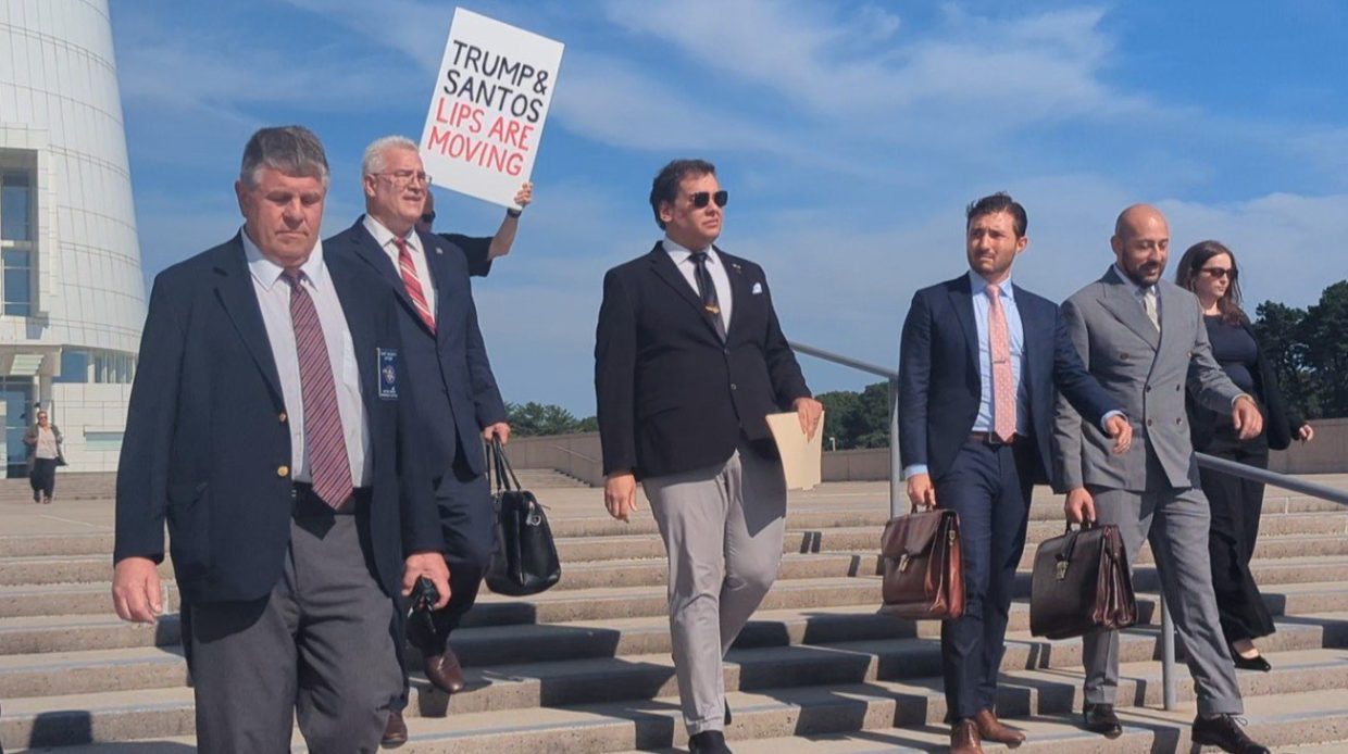 George Santos and his legal team leave the U.S. District Court following his guilty plea hearing.